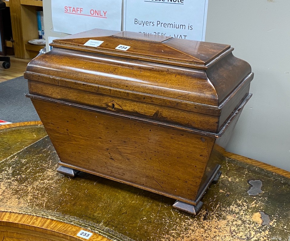A small George IV mahogany sarcophagus wine cooler, width 52cm, depth 31cm, height 42cm